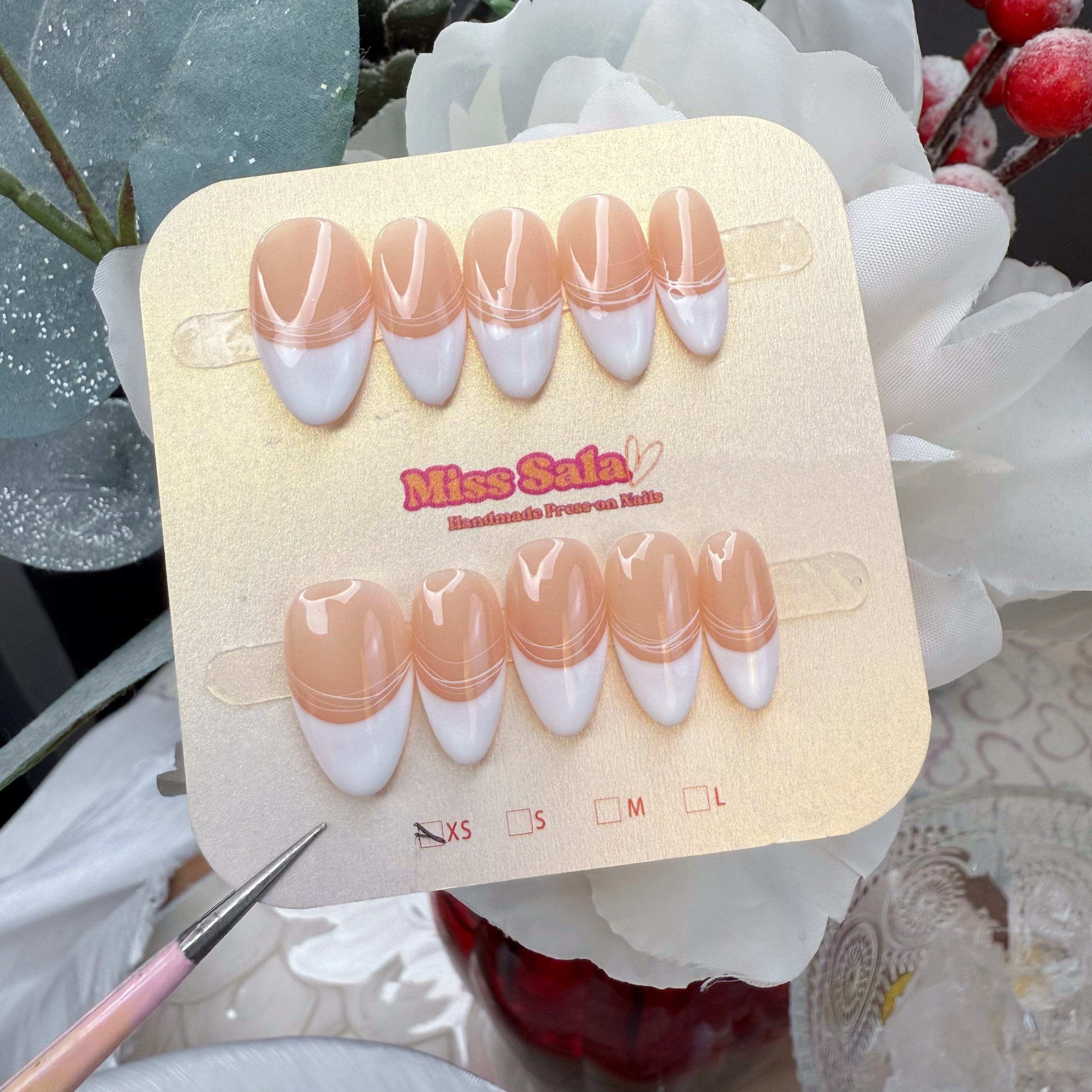 Almond-Shaped Press-On Nails with Nude Base, Crisp White French Tips, and Delicate Hand-Painted White Liner Art Accents